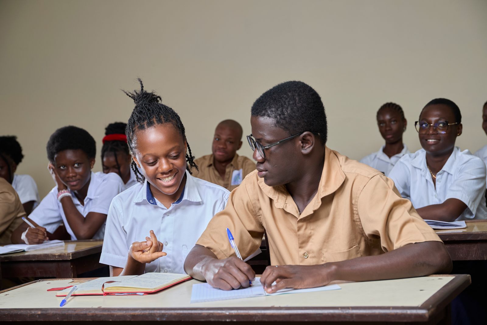 Secondary students collaborating during a lesson.